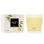 Vela de tres mechas Nest – Yuzu y Neroli iluminada por el sol
